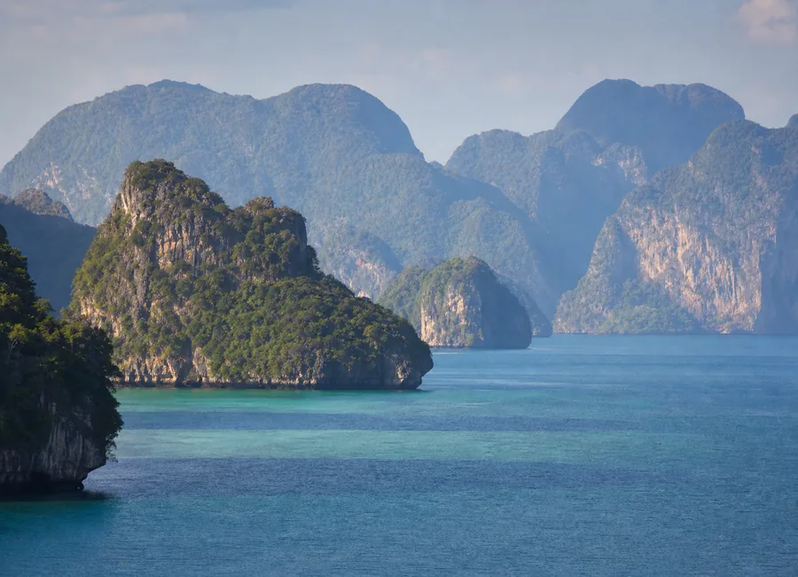 Limestone islands rising from the Andaman Sea